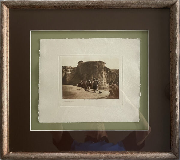 Edward Curtis - A Morning Chat Acoma - Four Acoma women with pottery vessels gathered at watering hole.